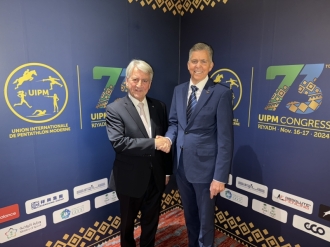 UIPM President Robert Stull OLY (right) with outgoing UIPM President Dr Klaus Schormann